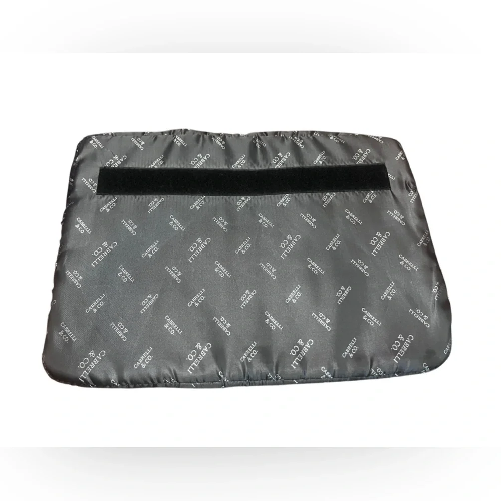 Silver and black Cabrelli & CO. inner laptop case